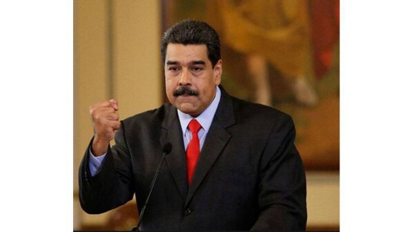 Мадуро выигрывает третий срок amid controversy in Venezuela